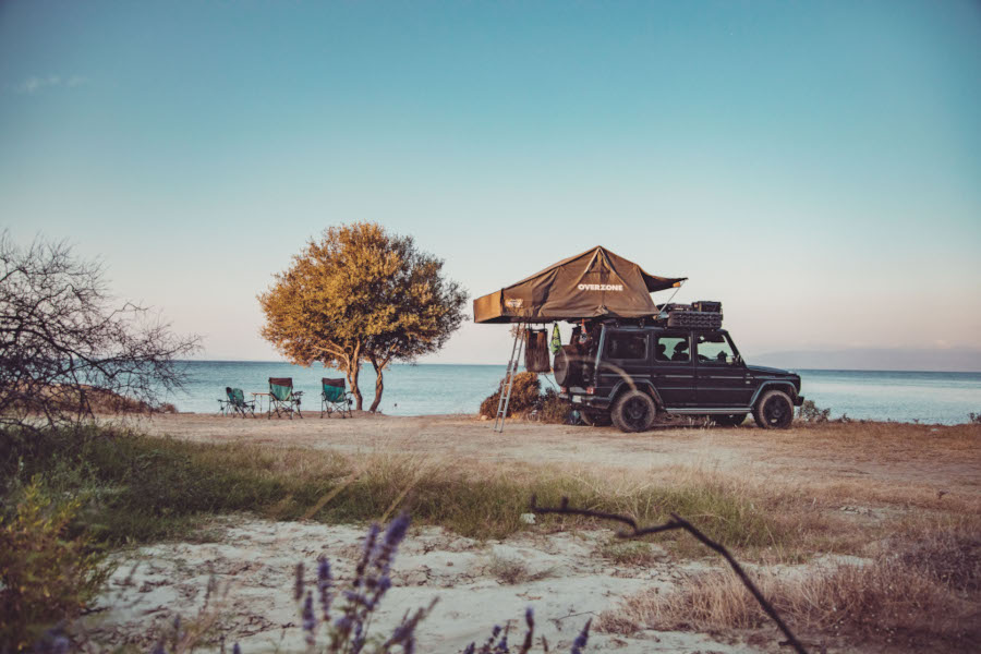 Rooftop tent camping by the beach in Morocco